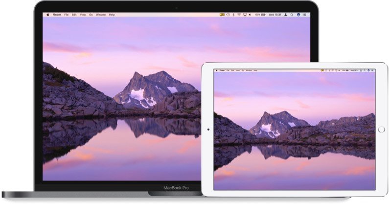 A MacBook and iPad displaying a connected extended workspace